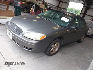 2005 Ford Taurus SE with VIN 1FAFP53U75A130186, listed as a IAAI auction lot 42155233 with 185,896 mi miles and . Bid and sale history available at carsss.com. Image 2.