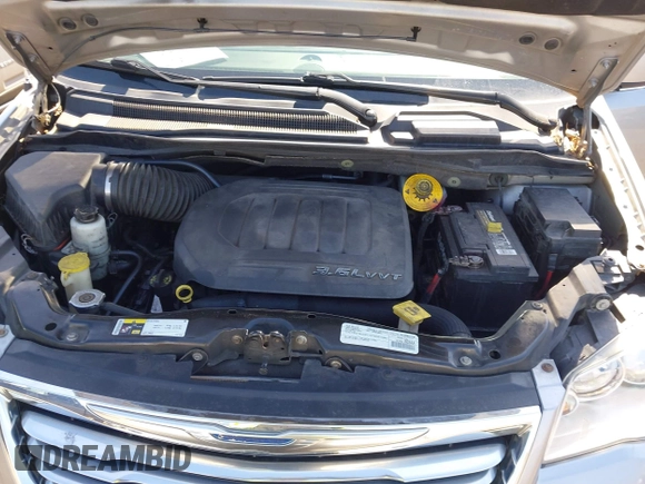2016 Chrysler Town & Country Touring with VIN 2C4RC1BGXGR185642, listed as a IAAI auction lot 42092927 with 124,085 mi miles and . Bid and sale history available at DreamBid. Image 10.