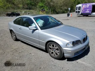 2000 BMW 3 Series 323Ci with VIN WBABM3345YJN83679, listed as a Copart auction lot 54029145 with 165,327 mi miles and Salvage Title. Bid and sale history available at DreamBid. Image 4.