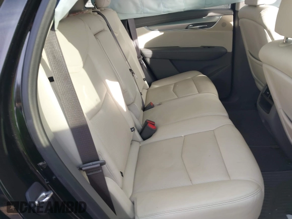 2019 Cadillac XT5 Luxury FWD z VIN 1GYKNCRSXKZ102866, wystawiony jako IAAI lot #41335840 z przebiegiem 59 563 mil mil oraz . Historia ofert i sprzedaży dostępna na DreamBid. Obrazek 8.