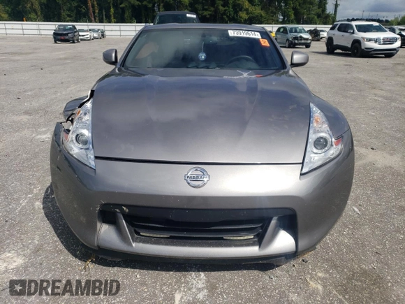 2010 Nissan 370Z Touring with VIN JN1AZ4EH8AM501134, listed as a Copart auction lot 73919614 with 106,599 mi miles and Salvage Title. Bid and sale history available at carsss.com. Image 5.