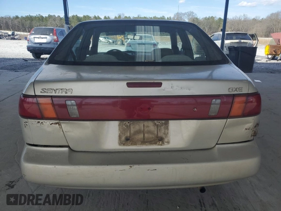 1997 Nissan Sentra XE z VIN 3N1AB41D3VL015032, wystawiony jako Copart lot #47238005 z przebiegiem 266 146 mil mil oraz Szkoda całkowita • Salvage title. Historia ofert i sprzedaży dostępna na DreamBid. Obrazek 6.