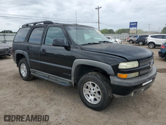 2003 Chevrolet Tahoe Z71 z VIN 1GNEK13Z13R301464, wystawiony jako Copart lot #53905395 z przebiegiem 165 360 mil mil oraz Szkoda całkowita • Salvage title. Historia ofert i sprzedaży dostępna na DreamBid. Obrazek 4.