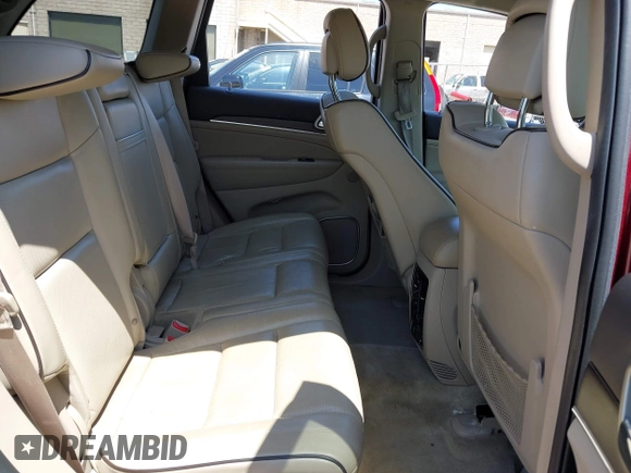 2017 Jeep Grand Cherokee Overland with VIN 1C4RJFCTXHC676236, listed as a IAAI auction lot 42164645 with 94,658 mi miles and . Bid and sale history available at DreamBid. Image 8.