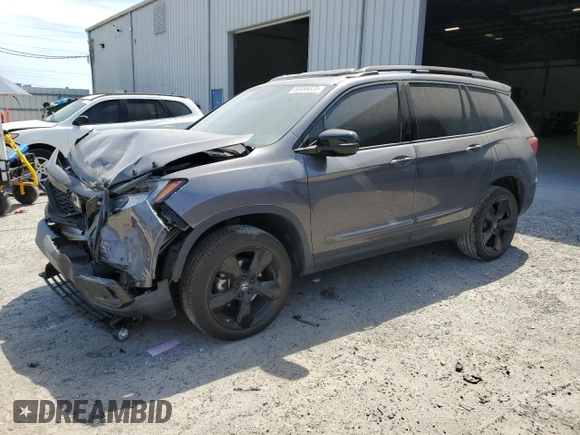 2021 Honda Passport Elite with VIN 5FNYF8H08MB014398, listed as a Copart auction lot 50499375 with 52,550 mi miles and Salvage Title. Bid and sale history available at DreamBid. Image 1.