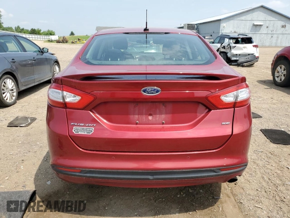 2013 Ford Fusion SE z VIN 3FA6P0H73DR322926, wystawiony jako Copart lot #63645105 z przebiegiem 122 086 mil mil oraz Czysty tytuł • Clean title. Historia ofert i sprzedaży dostępna na DreamBid. Obrazek 6.