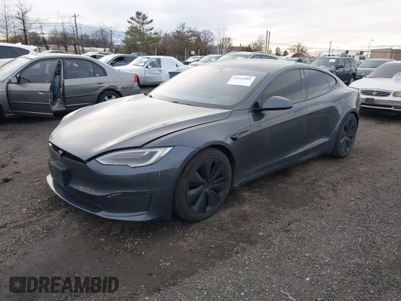 2021 Tesla Model S Long Range with VIN 5YJSA1E51MF440929, listed as a IAAI auction lot 41144902 with Not provided miles and . Bid and sale history available at DreamBid. Image 19.
