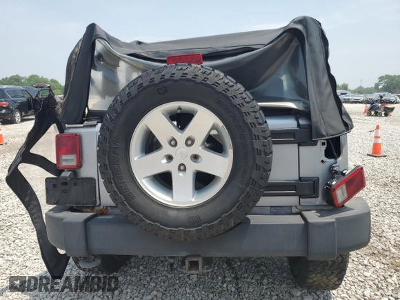 2013 Jeep Wrangler Sport with VIN 1C4AJWAG0DL696928, listed as a Copart auction lot 60822915 with 169,503 mi miles and Salvage title. Bid and sale history available at DreamBid. Image 6.