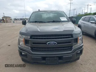 2020 Ford F-150 XL with VIN 1FTEW1E41LKE66857, listed as a IAAI auction lot 42041929 with 76,716 mi miles. Bid and sale history available at carsss.com. Image 12.