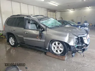 2005 GMC Envoy SLT z VIN 1GKDS13S152270398, wystawiony jako Copart lot #56160625 z przebiegiem 123 260 mil mil oraz Szkoda całkowita • Salvage title. Historia ofert i sprzedaży dostępna na DreamBid. Obrazek 4.