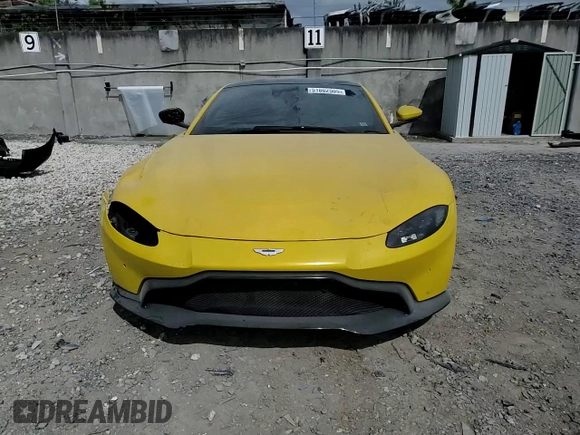 2019 Aston Martin Vantage z VIN SCFSMGAW6KGN01897, wystawiony jako Copart lot #51802505 z przebiegiem Nie podano mil oraz Szkoda całkowita • Salvage title. Historia ofert i sprzedaży dostępna na DreamBid. Obrazek 16.