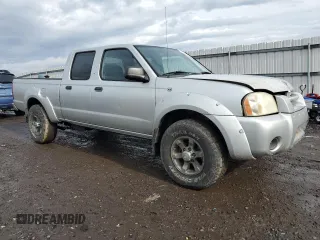 2004 Nissan Frontier XE with VIN 1N6ED29X94C415650, listed as a Copart auction lot 42880085 with 148,907 mi miles and Salvage title. Bid and sale history available at DreamBid. Image 4.