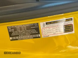 2018 McLaren 570S z VIN SBM13FAA2JW004563, wystawiony jako Copart lot #51371545 z przebiegiem 20 602 mil mil oraz Tytuł czysty. Historia ofert i sprzedaży dostępna na DreamBid. Obrazek 10.