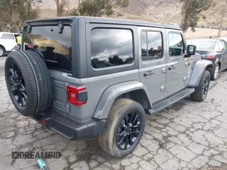 2021 Jeep Wrangler Unlimited Sahara with VIN 1C4JJXP64MW720263, listed as a IAAI auction lot 41514302 with 73,300 mi miles and . Bid and sale history available at DreamBid. Image 4.