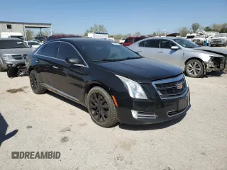 2016 Cadillac XTS Luxury Collection with VIN 2G61N5S37G9197536, listed as a Copart auction lot 52705785 with 143,434 mi miles and Salvage title. Bid and sale history available at DreamBid. Image 4.