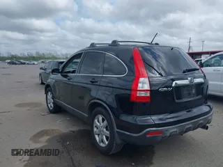 2007 Honda CR-V EX-L with VIN JHLRE38717C038957, listed as a IAAI auction lot 41935050 with 209,807 mi miles and . Bid and sale history available at carsss.com. Image 3.