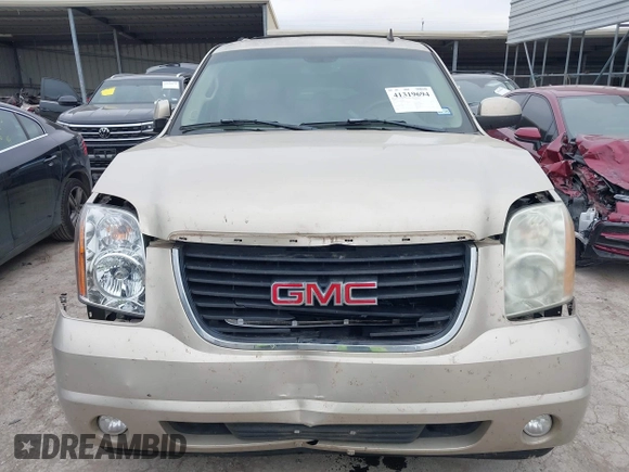 2007 GMC Yukon XL SLT z VIN 1GKFC16097R280171, wystawiony jako IAAI lot #41319694 z przebiegiem 241 553 mil mil oraz . Historia ofert i sprzedaży dostępna na DreamBid. Obrazek 12.