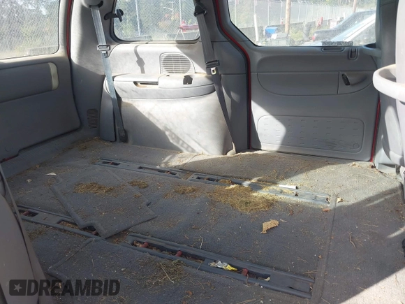 1999 Dodge Caravan with VIN 2B4FP2538XR373885, listed as a IAAI auction lot 40598760 with 218,089 mi miles and . Bid and sale history available at DreamBid. Image 8.