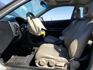 2000 Acura Integra LS with VIN JH4DC4453YS014754, listed as a Copart auction lot 61295265 with 135,573 mi miles and Salvage title. Bid and sale history available at DreamBid. Image 7.