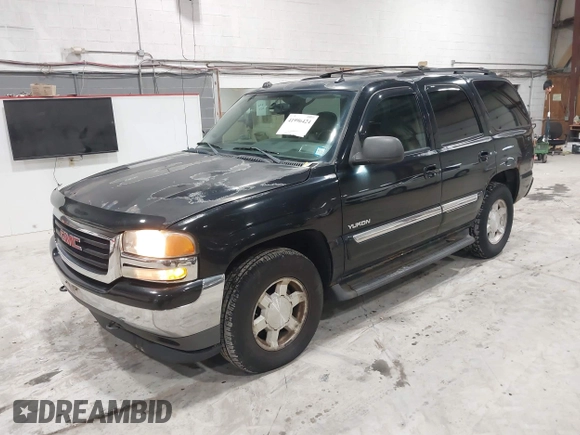 2005 GMC Yukon SLT with VIN 1GKEK13T15J143363, listed as a IAAI auction lot 41996424 with 272,819 mi miles. Bid and sale history available at carsss.com. Image 2.