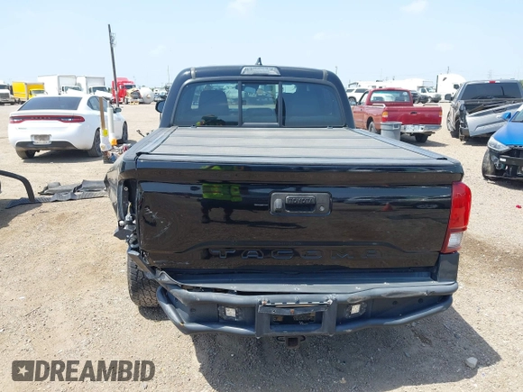 2018 Toyota Tacoma SR with VIN 5TFAX5GN5JX126118, listed as a IAAI auction lot 41949791 with 37,615 mi miles and . Bid and sale history available at DreamBid. Image 16.