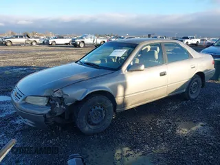 1997 Toyota Camry LE z VIN 4T1BG22K0VU019383, wystawiony jako IAAI lot #41271457 z przebiegiem 175 214 mil mil oraz . Historia ofert i sprzedaży dostępna na DreamBid. Obrazek 2.
