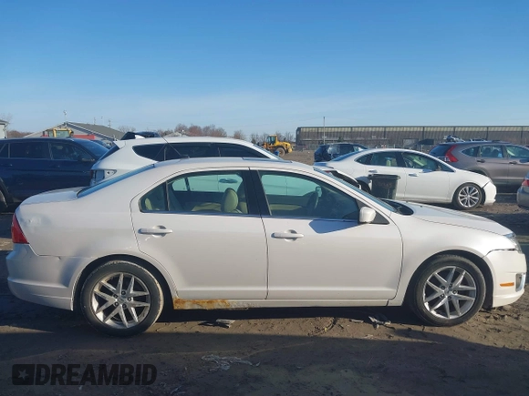 2012 Ford Fusion SEL z VIN 3FAHP0JA7CR104856, wystawiony jako IAAI lot #41816591 z przebiegiem 195 612 mil mil oraz . Historia ofert i sprzedaży dostępna na DreamBid. Obrazek 13.
