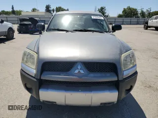 2006 Mitsubishi Raider Duro Cross z VIN 1Z7HC38N36S540424, wystawiony jako Copart lot #61032655 z przebiegiem 285 566 mil mil oraz Czysty tytuł • Clean title. Historia ofert i sprzedaży dostępna na DreamBid. Obrazek 5.