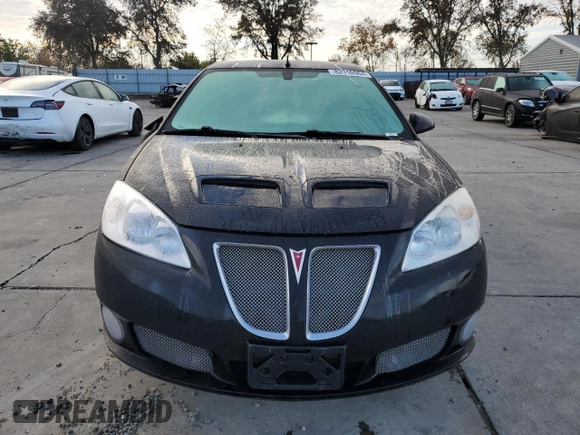 2008 Pontiac G6 GXP with VIN 1G2ZM577084181587, listed as a Copart auction lot 82910964 with 54,630 mi miles and Salvage Title. Bid and sale history available at DreamBid. Image 5.