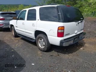 2003 Chevrolet Tahoe LT with VIN 1GNEC13Z03J150595, listed as a IAAI auction lot 42091129 with 247,732 mi miles. Bid and sale history available at carsss.com. Image 3.