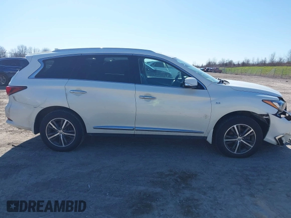 2019 Infiniti QX60 Luxe z VIN 5N1DL0MM1KC514667, wystawiony jako IAAI lot #42069954 z przebiegiem 85 975 mil mil oraz . Historia ofert i sprzedaży dostępna na DreamBid. Obrazek 14.