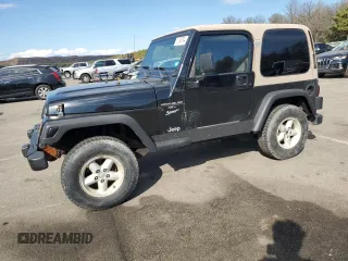 1999 Jeep Wrangler Sport with VIN 1J4FY19SXXP465037, listed as a Copart auction lot 54772405 with 50,942 mi miles and Non Repairable. Bid and sale history available at carsss.com. Image 1.