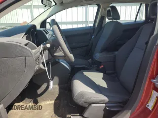 2009 Dodge Caliber SXT with VIN 1B3HB48A29D144304, listed as a Copart auction lot 53119375 with 173,778 mi miles and Salvage Title. Bid and sale history available at DreamBid. Image 7.