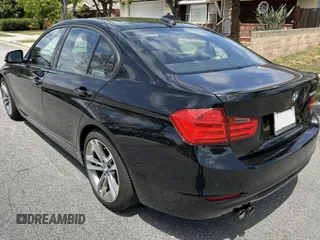 2014 BMW 3 Series 328i with VIN WBA3C1C52EK108680, listed as a IAAI auction lot 42153830 with 73,464 mi miles. Bid and sale history available at carsss.com. Image 3.