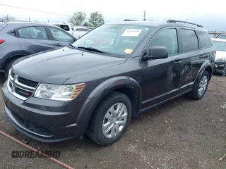 2017 Dodge Journey SE with VIN 3C4PDCAB9HT603595, listed as a IAAI auction lot 41914690 with 104,960 mi miles and . Bid and sale history available at DreamBid. Image 18.