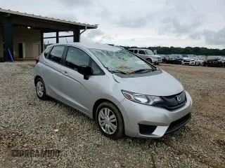 2015 Honda Fit LX z VIN 3HGGK5H58FM768130, wystawiony jako Copart lot #58184435 z przebiegiem 67 968 mil mil oraz Szkoda całkowita • Salvage title. Historia ofert i sprzedaży dostępna na DreamBid. Obrazek 13.