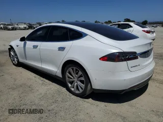2014 Tesla Model S 60 with VIN 5YJSA1H19EFP58677, listed as a Copart auction lot 61446345 with 150,152 mi miles and Salvage title. Bid and sale history available at DreamBid. Image 2.