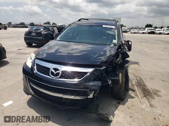 2012 Mazda CX-9 Grand Touring with VIN JM3TB2DA4C0361023, listed as a Copart auction lot 63839005 with 140,784 mi miles and Salvage title. Bid and sale history available at DreamBid. Image 14.