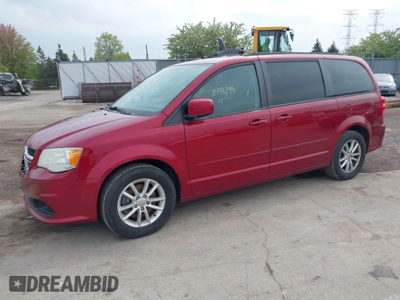 2014 Dodge Grand Caravan SXT with VIN 2C4RDGCG4ER120877, listed as a IAAI auction lot 42142083 with 199,895 mi miles and . Bid and sale history available at DreamBid. Image 2.