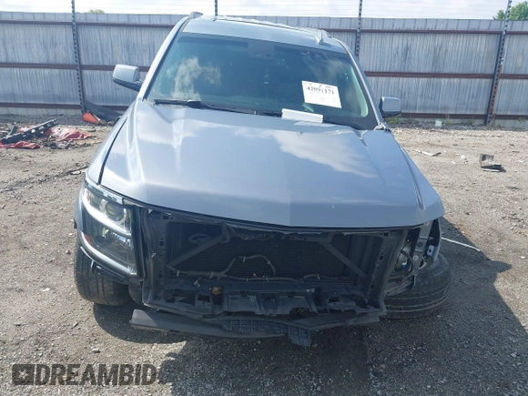 2016 Chevrolet Tahoe LT with VIN 1GNSCBKC2GR257077, listed as a IAAI auction lot 42091171 with 118,660 mi miles and . Bid and sale history available at DreamBid. Image 6.
