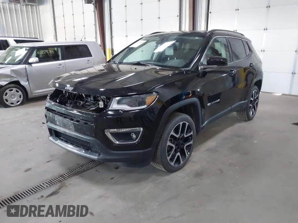2021 Jeep Compass Limited with VIN 3C4NJDCBXMT600248, listed as a IAAI auction lot 42224412 with 58,832 mi miles and . Bid and sale history available at DreamBid. Image 2.