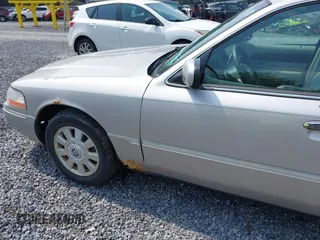 2004 Mercury Grand Marquis LS Premium z VIN 2MEFM75W04X634791, wystawiony jako IAAI lot #42482387 z przebiegiem 133 145 mil mil oraz . Historia ofert i sprzedaży dostępna na DreamBid. Obrazek 6.