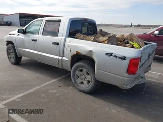 2005 Dodge Dakota SLT with VIN 1D7HW48N45S127702, listed as a IAAI auction lot 41492769 with Not Provided miles. Bid and sale history available at carsss.com. Image 3.