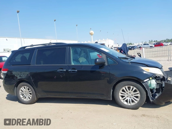 2014 Toyota Sienna XLE with VIN 5TDYK3DC2ES492554, listed as a IAAI auction lot 41685109 with 196,619 mi miles and . Bid and sale history available at DreamBid. Image 13.