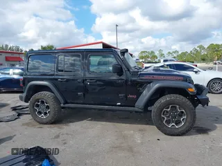 2023 Jeep Wrangler Rubicon with VIN 1C4HJXFGXPW534515, listed as a IAAI auction lot 41524419 with 21,376 mi miles and . Bid and sale history available at DreamBid. Image 13.