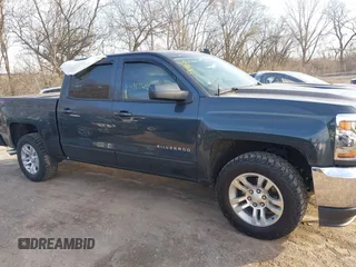 2017 Chevrolet Silverado 1500 LT with VIN 3GCUKREC5HG348435, listed as a IAAI auction lot 41821369 with 140,000 mi miles and . Bid and sale history available at DreamBid. Image 14.