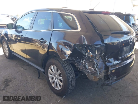 2012 Mazda CX-7 i Touring z VIN JM3ER2CMXC0421774, wystawiony jako IAAI lot #41743231 z przebiegiem 132 488 mil mil oraz . Historia ofert i sprzedaży dostępna na DreamBid. Obrazek 3.