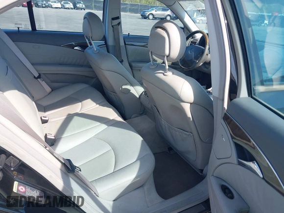 2003 Mercedes-Benz E-Class 3.2L with VIN WDBUF65J33A112308, listed as a IAAI auction lot 41871334 with 138,522 mi miles. Bid and sale history available at carsss.com. Image 8.