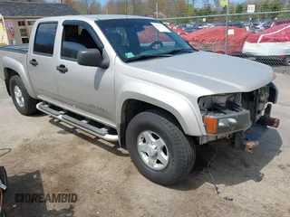 2004 GMC Canyon 1SB SLE Z85 with VIN 1GTDT136848196663, listed as a IAAI auction lot 42043079 with 220,904 mi miles. Bid and sale history available at carsss.com. Image 1.