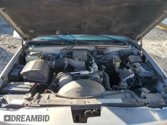 1999 GMC Denali z VIN 1GKEK13R4XR918005, wystawiony jako Copart lot #74964184 z przebiegiem 206 584 mil mil oraz Nie do naprawy. Historia ofert i sprzedaży dostępna na DreamBid. Obrazek 12.